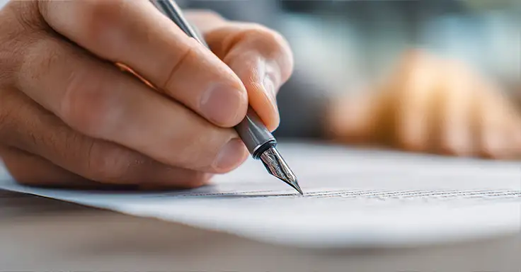 Unterschrift unter den Kaufvertrag